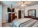 Spacious primary bedroom with en-suite bathroom access and sophisticated decor at 8101 S San Juan Range Rd, Littleton, CO 80127