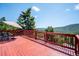 Spacious outdoor deck with mountain view, perfect for entertaining and relaxation at 32392 Lodgepole Dr, Evergreen, CO 80439