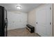 Well-organized mud room with a bench, storage baskets, and a closet for coats and shoes at 3980 S Dexter St, Cherry Hills Village, CO 80113