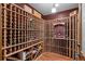 Spacious custom wine cellar with wooden racks and space for storing a vast collection of bottles at 3980 S Dexter St, Cherry Hills Village, CO 80113