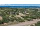 Beautiful mountain views surround this idyllic home on sprawling acreage with mature trees and private drive at 3488 Dawson Rd, Sedalia, CO 80135
