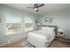Cozy bedroom with plush carpet, two windows and ample natural light offering comfortable living at 3488 Dawson Rd, Sedalia, CO 80135