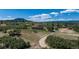 Inviting two-story home with a manicured lawn, mature trees, and a private drive leading to a serene setting at 3488 Dawson Rd, Sedalia, CO 80135
