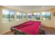 Pool table in the game room with expansive outdoor views at 3488 Dawson Rd, Sedalia, CO 80135