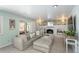 Cozy living room with a fireplace and neutral tones at 3488 Dawson Rd, Sedalia, CO 80135