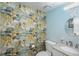 Stylish powder room featuring unique floral wallpaper, light blue walls, and granite countertop at 3488 Dawson Rd, Sedalia, CO 80135