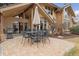 Outdoor patio, perfect for entertaining, with a barbecue grill and comfortable seating arrangement at 5149 E Links Cir, Centennial, CO 80122