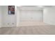 Spacious unfinished basement, ready for customization, with tiled flooring and ample lighting at 5149 E Links Cir, Centennial, CO 80122