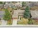 Beautiful single-Gathering home with a well-manicured lawn and attached two-car garage at 5149 E Links Cir, Centennial, CO 80122