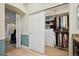 Walk-in closet with custom shelving and organizational features at 9882 S Hoyt Ct, Littleton, CO 80127