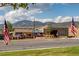 Littleton Fire Rescue Station 19 with American flags, against mountain views at 9882 S Hoyt Ct, Littleton, CO 80127