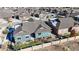 Aerial view of the home's backyard, including stone perimeter fencing at 3565 New Haven Cir, Castle Rock, CO 80109