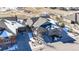 Aerial view of home's exterior shows meticulous landscaping and great curb appeal at 3565 New Haven Cir, Castle Rock, CO 80109