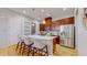 Modern kitchen featuring a spacious island with seating, stainless steel appliances, and plenty of storage at 3565 New Haven Cir, Castle Rock, CO 80109