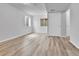 This finished basement has light gray vinyl floors, light colored walls, and two windows at 22974 E Dorado Dr, Aurora, CO 80015