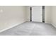 Neutral bedroom featuring soft carpet, closet, and light colored walls at 22974 E Dorado Dr, Aurora, CO 80015