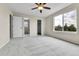 Large carpeted bedroom features a closet, and entry to an ensuite bathroom at 22974 E Dorado Dr, Aurora, CO 80015