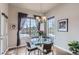 Charming breakfast nook with large windows and a view of the outdoors at 15855 Wild Horse Dr, Broomfield, CO 80023