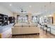 Open concept living space with hardwood floors, recessed lights, and a ceiling fan at 15855 Wild Horse Dr, Broomfield, CO 80023