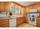Well-lit kitchen featuring ample cabinet space, modern appliances, and a bright, airy feel at 7839 Florado St, Denver, CO 80221