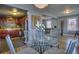 Open floorplan with dining, living, and kitchen areas well lit and easily connected at 1629 Valentia St, Denver, CO 80220