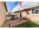 Charming home with brick patio, privacy fence, and meticulously maintained lawn at 9310 Pierce St, Broomfield, CO 80021