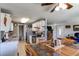 Bright kitchen featuring white cabinets, modern appliances, and an adjacent dining area at 9310 Pierce St, Broomfield, CO 80021