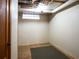 Basement area with a small window and open space, ready for customization at 2345 S Williams St, Denver, CO 80210