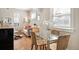 Open floor plan with dining area connecting to the living space, perfect for entertaining at 2345 S Williams St, Denver, CO 80210