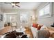 Inviting living room with natural light, hardwood floors, and a comfortable seating area at 2345 S Williams St, Denver, CO 80210