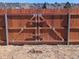 A well-built wooden fence with metal supports offering security and privacy for the property at 17968 E Colgate Pl, Aurora, CO 80013