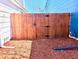 Sturdy wooden fence with decorative hardware enhances the backyard's privacy and aesthetic appeal at 17968 E Colgate Pl, Aurora, CO 80013
