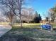 Image of the entrance sign of Pagosa Park, including playground, trees and manicured lawn at 17968 E Colgate Pl, Aurora, CO 80013