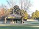 Park picnic shelter with tables & benches, perfect for Gathering gatherings and outdoor events within a scenic landscape at 17968 E Colgate Pl, Aurora, CO 80013