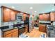 Updated kitchen boasts granite countertops, stainless steel appliances, and ample cabinet space at 1376 S Laredo Ct, Aurora, CO 80017