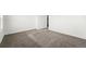 Bedroom featuring neutral carpet and white walls at 8816 Whiteclover St, Littleton, CO 80125