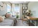 Cozy bedroom featuring a daybed, desk area, and a bright window, ideal for a or guest room at 8816 Whiteclover St, Littleton, CO 80125