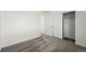 Bright bedroom featuring neutral carpeting, a closet, and white trim throughout the space at 8816 Whiteclover St, Littleton, CO 80125