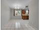 Bright dining area with kitchen access and tile floor at 14657 E Oregon Dr, Aurora, CO 80012