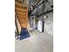 Basement utility area featuring the furnace, hot water heater, and some unfinished walls at 21580 Longs Peak Ln, Parker, CO 80138