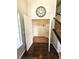 Coat closet off front entrance with custom shelving offers ample storage space at 21580 Longs Peak Ln, Parker, CO 80138