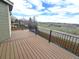 Deck with black metal railing overlooking a scenic view at 21580 Longs Peak Ln, Parker, CO 80138