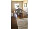 Inviting dining room with elegant hardwood floors, stylish rug, and modern decor at 21580 Longs Peak Ln, Parker, CO 80138