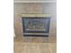 Stylish fireplace featuring decorative tile surround, adding warmth and charm to the living space at 21580 Longs Peak Ln, Parker, CO 80138