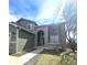 Charming two-story home with stone entryway and landscaped front yard at 21580 Longs Peak Ln, Parker, CO 80138