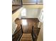 View from second story to first, looking down at hardwood floor and railing, with great natural light at 21580 Longs Peak Ln, Parker, CO 80138