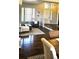 Open living space featuring hardwood floors, natural light, and an inviting atmosphere at 21580 Longs Peak Ln, Parker, CO 80138