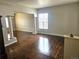 Spacious living room showcasing hardwood floors, abundant natural light, and stylish architectural details at 21580 Longs Peak Ln, Parker, CO 80138