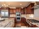 Chef's kitchen featuring stainless steel appliances and granite countertops at 22435 Boundstone Dr, Parker, CO 80138