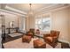 Comfortable seating arrangement in a well-lit living room at 22435 Boundstone Dr, Parker, CO 80138